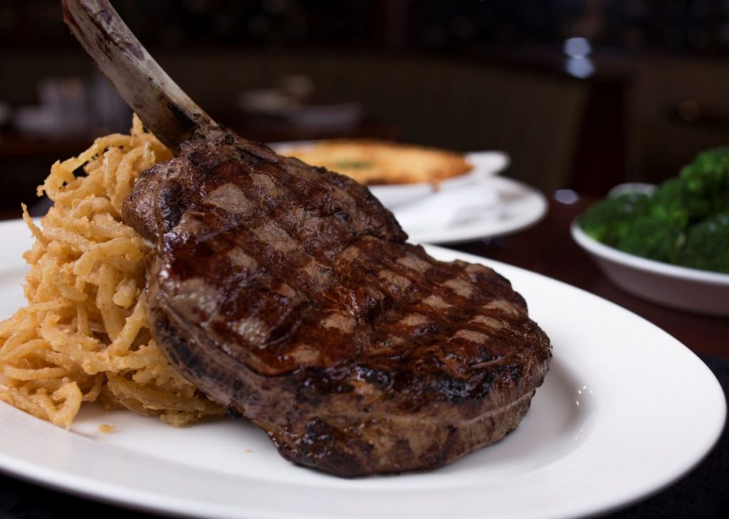 Bone-in Ribeye Steak plated