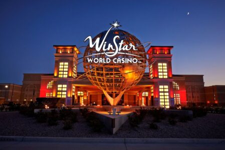 Night view of the front of WinStar World Casino and Resort where Kirby's Steakhouse is located and where you can make a dinner reservation for any occasion