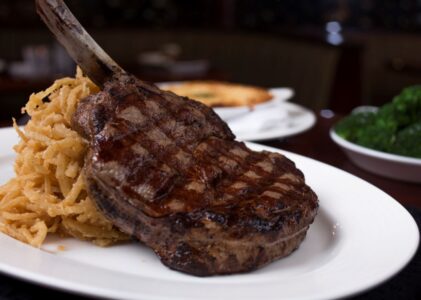 Bone-in Ribeye Steak plated